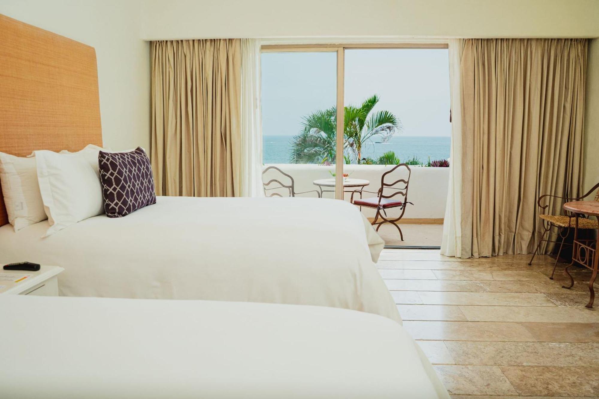 فندق Camino Real Zaashila Huatulco سانتا كروز هواتولكو المظهر الخارجي الصورة A room at the hotel